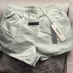 Essentials Fear of God Sea Foam running shorts; brand new with tags. Mens XS